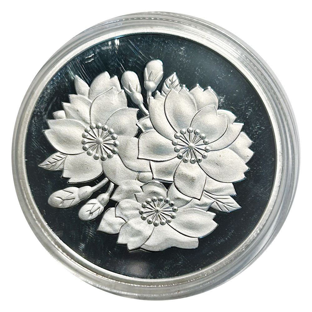 Lucky Coin Cherry Blossom Floral in Protective Plastic Capsule