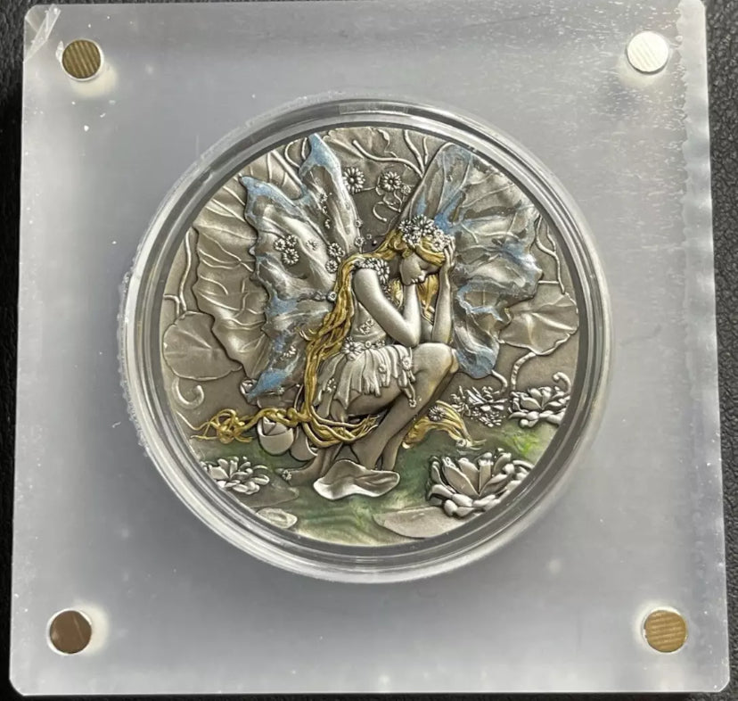 2025 2 Oz .999 Silver Fairy in Magicland: Flower Fairy Antiqued Glow in the Dark