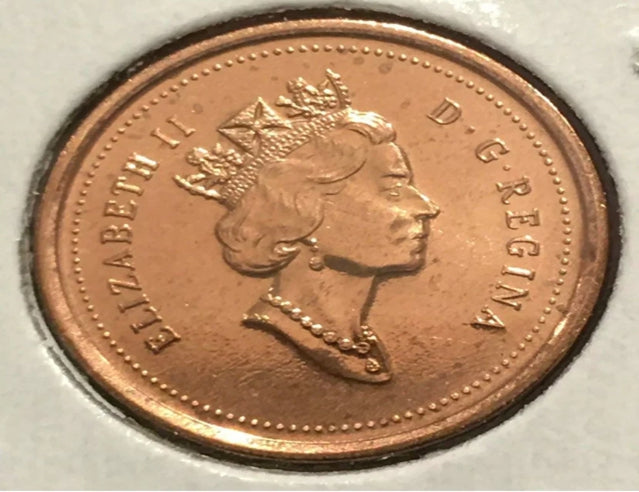 1999 Canada 1 Cent Error Coin un point sur le dessus du N au Canada + « N » Dot Variety BU.
